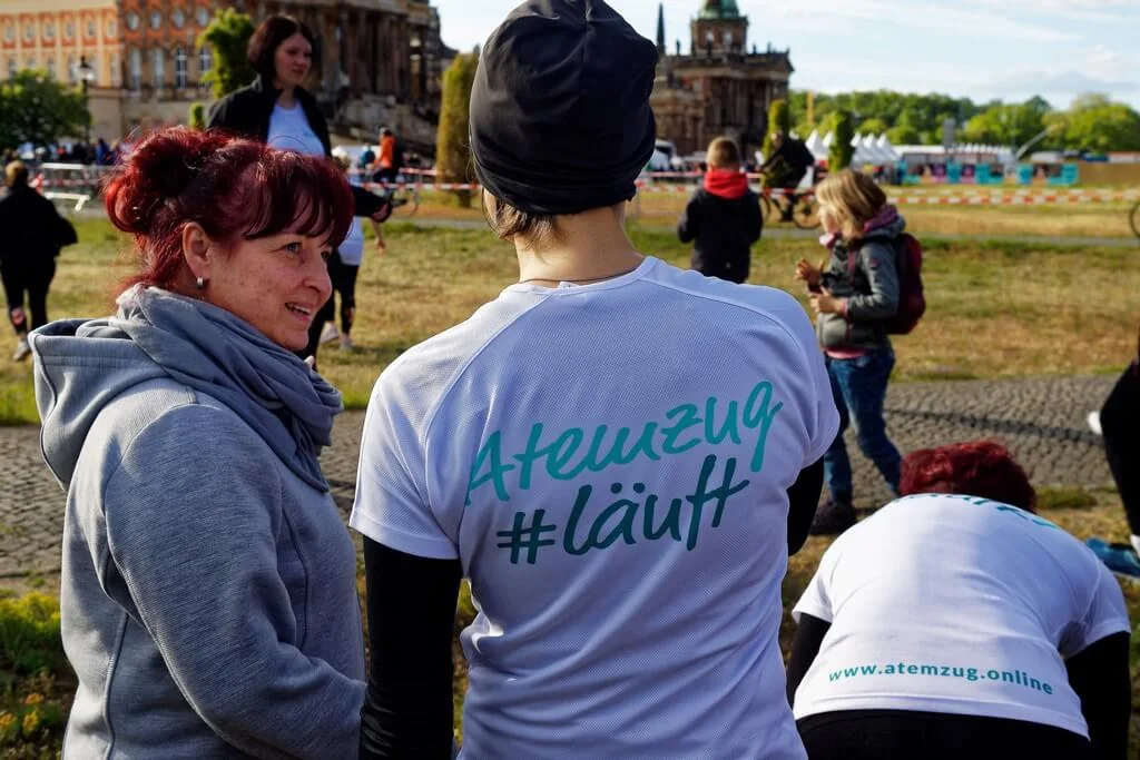 Atemzug-Laufteam bei einer Sportveranstaltung